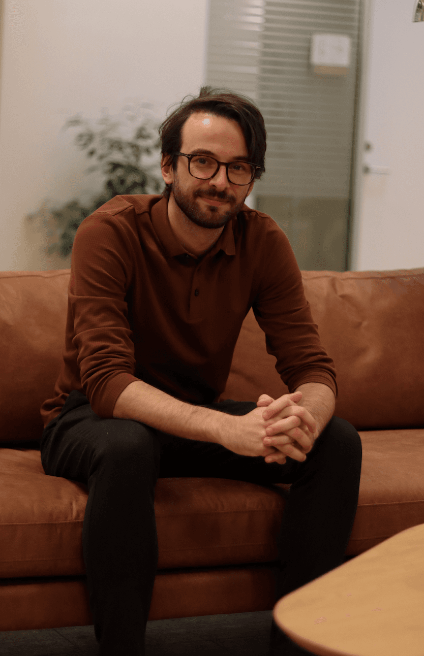 David Carlos Zachariae sitting on a sofa